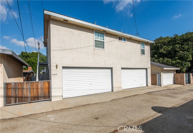 Two 2-Car Garages and Second Unit Above Garages