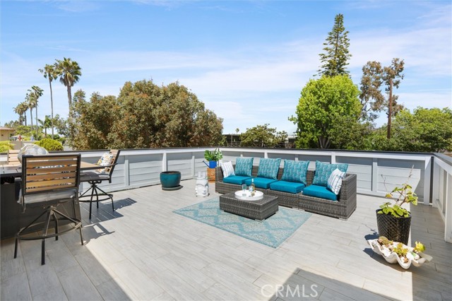 Outdoor living space: Patio (about 400 SF!) on top of the garage, access from the living room of the home