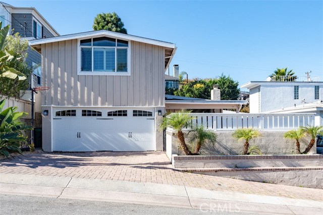 2105 Walnut Avenue Manhattan Beach, California Lovely Tree Section home with personality and unlimited potential. Home features 4 bedrooms, one of which leads to the backyard (currently being used as a den) with a connecting 3/4 bathroom. Spacious Master Bedroom upstairs over the garage. Lush private backyard with Turf grass area and plenty of room for future add on to the house. Additional features include vaulted beam ceilings, hardwood floors, Plantation shutters, a fireplace in the living room, skylight, large enclosed front patio, brand new carpet, stainless steel kitchen appliances, and a 2 car garage. Feel the ocean breeze and take advantage of the great neighborhood and Manhattan Beach Award Winning Schools.