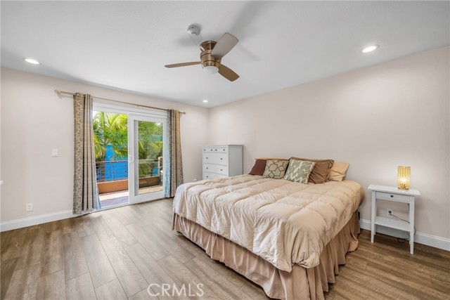 Primary bedroom with additional patio