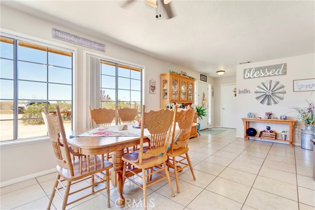 Dining room is bright and open and has plenty of space for every day dining and entertaining.