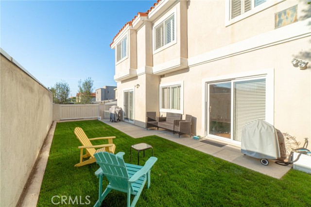 Backyard with access from both the dining room and family room