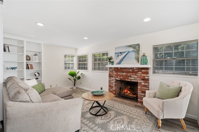 Family room with fireplace and built-ins.