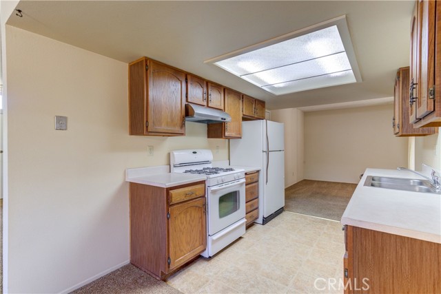 Kitchen has a 4 burner gas range