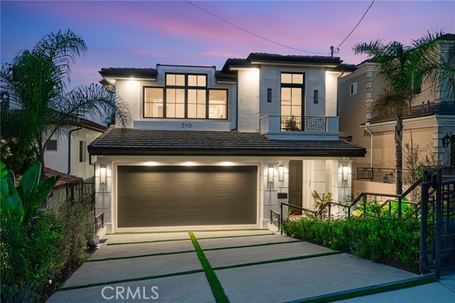 510 N Dianthus Street Manhattan Beach, California EXECUTIVE DREAM HOME! The moment you walk up to the 4’ pivot door entry, this home will be calling your name. Light and bright do not begin to describe this 5 bedroom, 3.5 bath masterpiece, with unique and unforgettable design touches throughout. Open living spaces with floor to ceiling sliding doors in the living room + bar as well as the wide open Wolf-equipped kitchen connect to a secluded backyard oasis with seating, fireplace and a dual grill setup. An artfully crafted winding staircase takes you upstairs to a vast master bedroom with a reading nook and, once again, access to the open air on a private patio. The master bath is a home in its own right, with a spa shower and standalone tub. Did we mention the walk-in closet? Smart home-equipped with breathtaking views of downtown Los Angeles. You might never even want to leave home again…