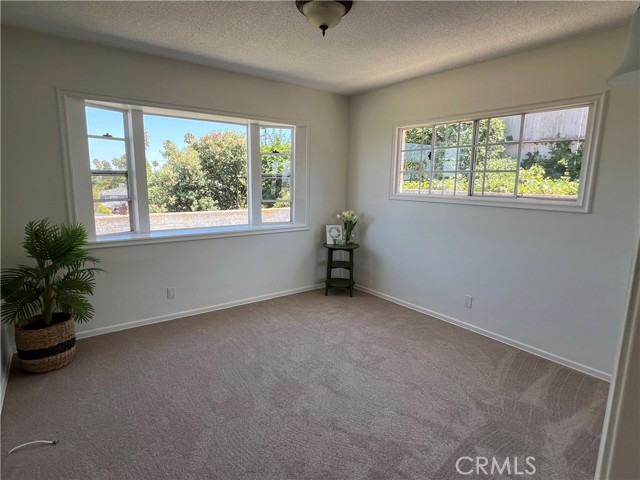 primary bedroom with natural light and fabulous view