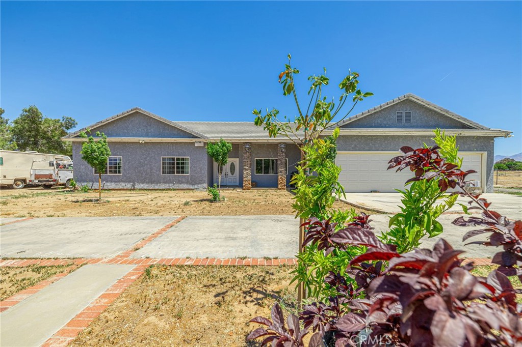 Welcome to your dream Ranch-Style Home in the Beautiful City of Palmdale, this property sit on 1.06 acres, fully fenced lot with a circular driveway.
This home offers both luxusy and practicality with high ceilings on a open floor plan and abudant natural light throughtout. Entry way leads to a forms living and dining room, the kitchen boasts tile and granite counter tops and tons of cabinets.
3 large bedrooms, 2 baths, huge master bedroom, tile flooring throughout, 3 car garage.
The expansive lot provides incredible potential for new homewoner to build additional ADUs or convert the garage into a separate living spaces (as permited by City).