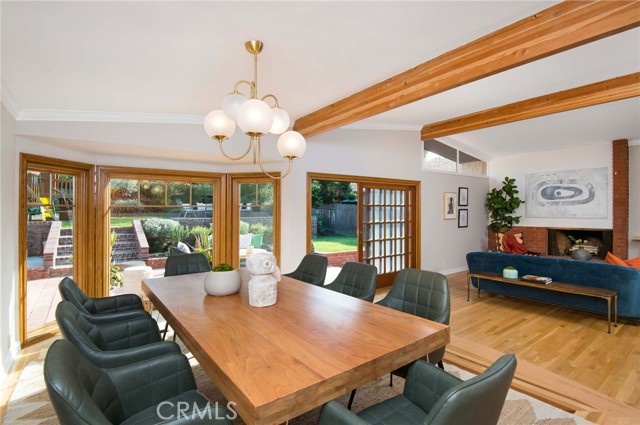 Dining Room open to Living Room and backyard.