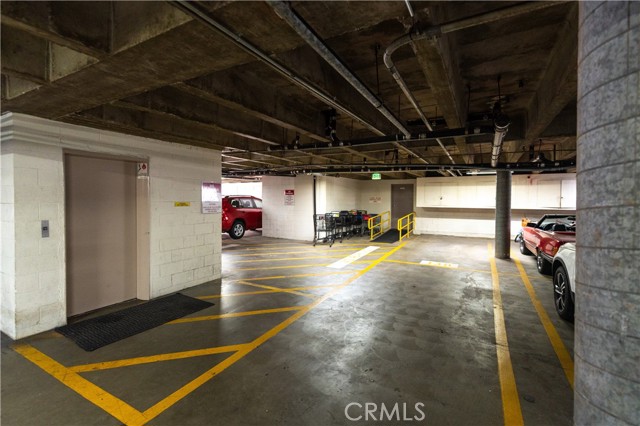 Tandem parking spaces next to the back elevator that delivers your right to your front door.