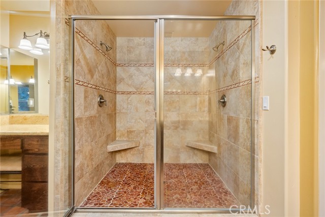 Huge tiled shower with dual shower heads!