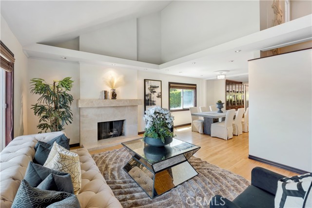 Refinished hardwood floors, vaulted ceilings and plenty of natural light.
