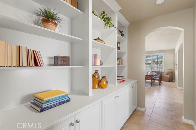 Hallway built-in bookshelves and cabinets