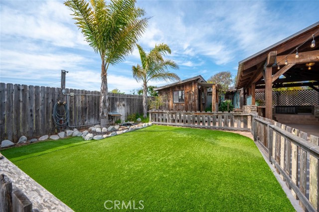 Fenced area with artificial turf