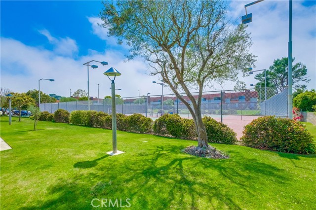 Lush landscaping throughout complex.