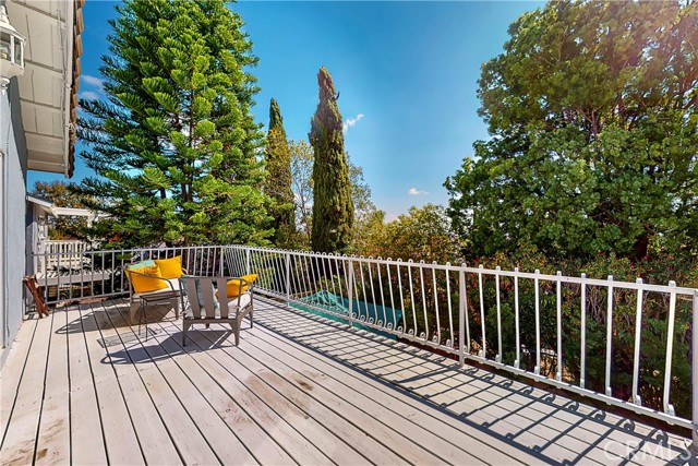 Extra large balcony deck with beautiful treetop views and peek a boo harbor view