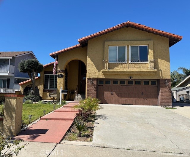 This beautiful two story remodeled turn-key home is located in the desirable community of Anaheim Hills, offering a spacious and inviting living atmosphere. This house has modern paint colors, high ceilings, and an open floor plan. The expansive windows allow a lot of natural light in the home. The remodeled cozy living room has a nice fireplace and has a lot of room for entertaining guests. The upgraded kitchen has very elegant nice granite counter tops, remodeled wooden cabinets, high-end stainless steel appliances and there is a nice view of the pool in the backyard. This house offers multiple good sized bedrooms, including a big master suite that has wood floors, recessed lighting, a ceiling fan and plenty of closet space. The secondary bedrooms have wood flooring, ceiling fans, spacious closets, and also share a nicely remodeled bathroom with double sinks. The upgraded bathroom features nice tile floors, granite counters, and an upgraded shower. There is a fourth bedroom in this home that can be used as an office. Outside in the backyard enjoy plenty of privacy, a lot of open space with a view of a big pool and warm jacuzzi surrounded by beautiful palm trees. This house has been fully remodeled, it is perfect and ready for someone to call their new home. Close to the 91 Fwy, great parks, schools, and restaurants.