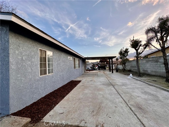 extra long driveway alongside the home