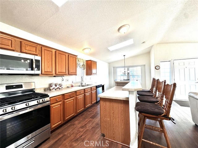 Large kitchen open to living room, dining room