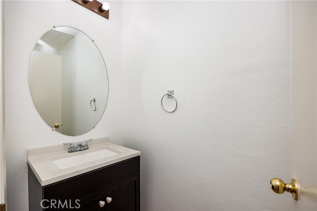 Half bathroom on near kitchen and laundry room