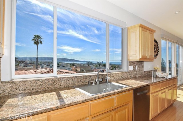 You won't know you're doing the dishes as you get lost in this gorgeous view!