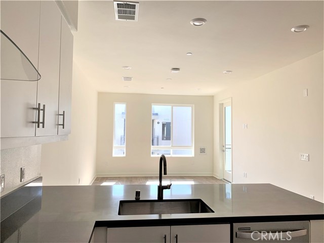 2540 Nolita Irvine, California Highly upgraded bright top floor Courtyard facing one bedrooms one bathroom modern living at Central Irvine! Extremely convenient location! Wi-Fi certified home with preinstalled smart features supported by Amazon. Designer selected laminated wood flooring in kitchen and living room, upgraded carpet for bedroom flooring. Refrigerator, washer and dryer equipped. Trash service included. Resort style community amenities include a clubhouse, fitness center, pools and spas, BBQ area.