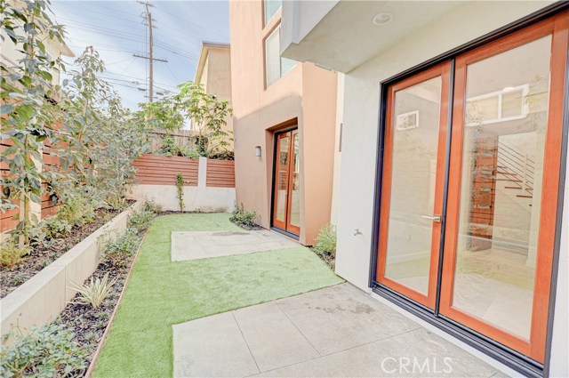 FRENCH DOORS TO BACKYARD