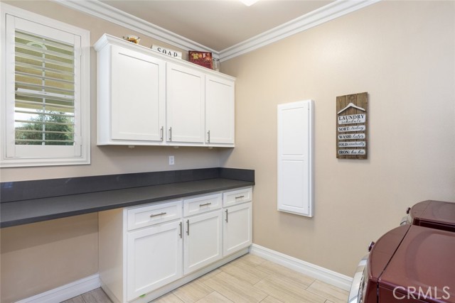 Downstairs Laundry Room Adjacent to 
Kithcen