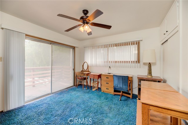 Bedroom #2 has two closets and a view of the backyard and equestrian area