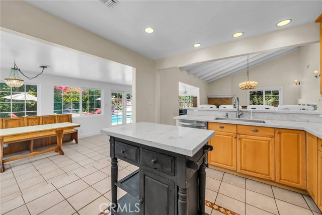 Kitchen open to the Sun Room