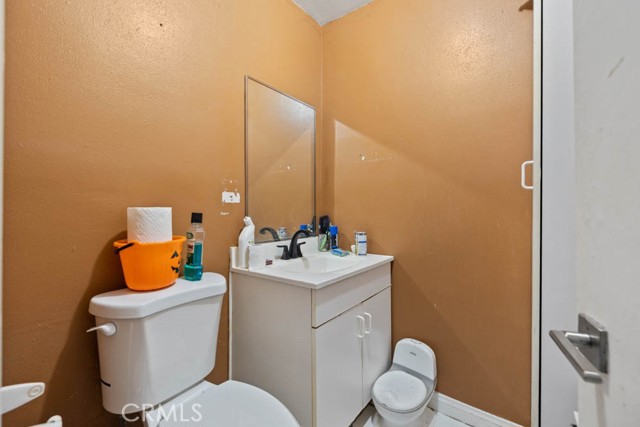 Bathroom in back office space.