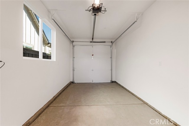 Tandem garage bay for extra parking, shop space or pull through to backyard