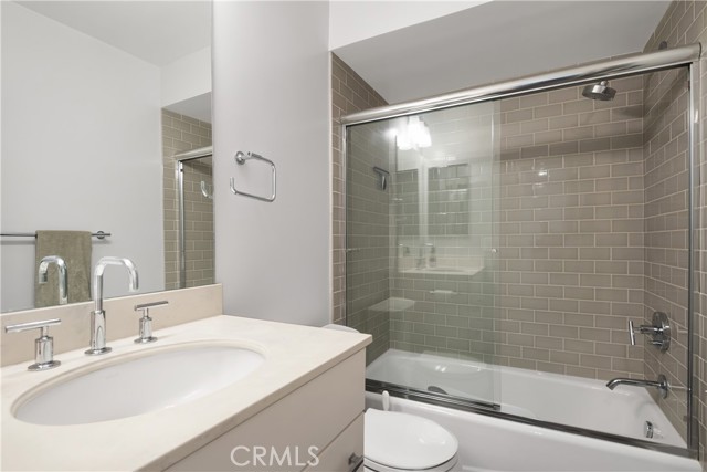 Common full bath that services the #2 and #3 bedrooms