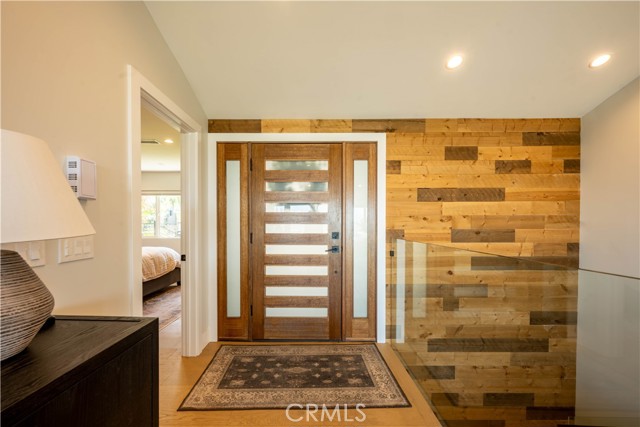 Entry way with reclaimed wood wall