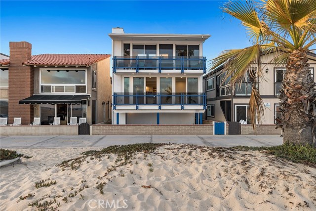 1516 W Oceanfront Newport Beach, California Step up to the oceanfront lifestyle! Superbly positioned between the Balboa and Newport piers and just a short stroll from bustling Marina Park and myriad water activities, this freshly remodeled three bedroom, two bath, separately deeded, R-2 condo affords a unique turn-key opportunity to live waterfront in Newport Beach. Enjoy easy, breezy single-level living with direct elevator access, and an open lay out that revels in whitewater views and sunsets behind Catalina. Floor-to-ceiling glass opens to a seaside terrace perfect for soaking up the sun and enjoying the activity of the beach front below. Open format living, dining and kitchen areas play to relaxed days spent at the beach with family and friends. A newly remodeled kitchen boasts abundant storage and prep space, top-line appliances, and separate butler's pantry with wine refrigeration to make entertaining a breeze. An adjacent patio is perfect for cozy outdoor dining and BBQ fun. With three generously proportioned guest rooms, the master suite is highlighted by a spa bath with dual vanities, shower and soaking tub. A separate laundry room also allows for additional storage. Truly a one-of-a-kind opportunity on the oceanfront promenade, this condo is one of only two units in the three-story building. Each owner enjoys 3 car garage parking, a large storage area, beach bath, and access to a common beach front patio. Grab your beach bag and head to the sand...this coastal condo checks all of the boxes! VIRTUALLY STAGED