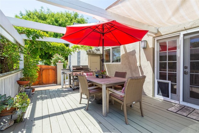 wood deck with wisteria vines