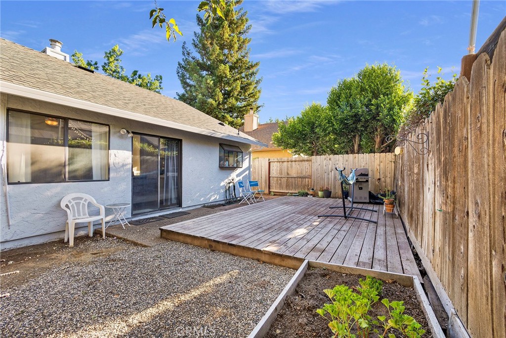 Backyard with deck and raised beds for your garden!
