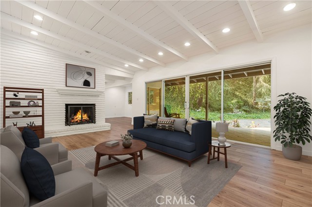 Living room with beamed ceilings