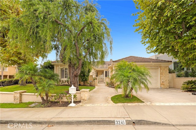 3241 Rimcrest Circle Laguna Beach, California It doesn't get much better than this. This SINGLE LEVEL, 2,300 sq.ft. home has been elegantly remodeled. It is situated on a 7,405 sq.ft lot corner lot, on a private cul-de-sac street in one of the most desirable areas of Laguna Beach. This home has 2 MASTER SUITES, 3 bathrooms, a spacious formal dining room, large formal living room, amazing great room, built in wet bar, a gourmet kitchen with granite counters, stainless steel appliances, custom cove ceiling with skylights, a sub-zero refrigerator and a tremendous amount of cabinets and counter space. The home has quality which is second to none. There are custom coffered ceilings, crown moldings, built in cabinetry, walnut flooring, large spacious bathrooms with limestone counters and a fireplace with a custom made limestone mantel and surround. This beautiful home is professionally landscaped, has a large front yard with mature trees and a backyard that is perfect for entertaining. There are custom plantation shutters and window coverings as well as automatic awnings. It has been meticulous maintained and is ready to move in! You will not find a better single level home in a nicer area in Laguna Beach. It is close to parks, schools, hiking & biking trails. A must see!