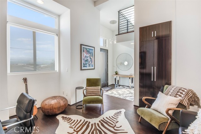 Formal Living room with soaring high ceilings.