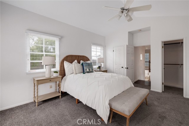 Main bedroom, dual walk in closets Vaulted ceilings