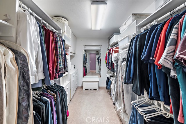 Oversize primary closet with extra storage.