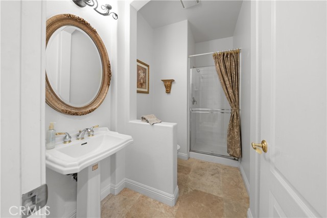 Bathroom #1: Downstairs 3/4 bath/powder room.