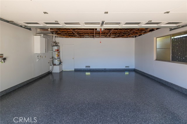 Double Garage with finished walls and new epoxy floor