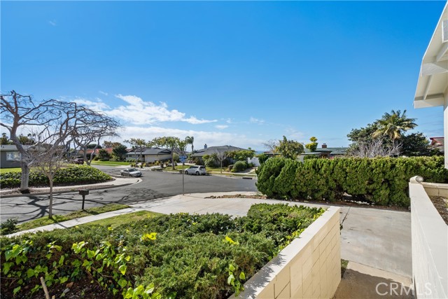 Peek-a-boo Ocean and Catalina view from this corner lot on a Cul de Sac