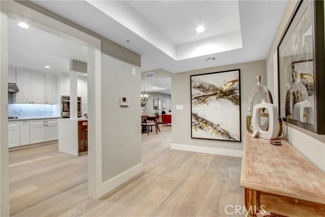 410 S Barrington Avenue 304 Brentwood, California Priced at 2019 price, see unit #105 2 years ago!! Enter this stunning home with a beautiful entryway leading to a new open floorplan. The breathtaking chefs kitchen is a pleaser to the eyes as well as a delight to the home chef. Enjoy the new white shaker soft close cabinets and quartz countertops, new gorgeous backsplash, new appliances including a built in double oven, and a great entertainers island with wine frig and microwave. The home is set off by all new recessed lighting throughout the entire unit, new flooring, and new carpet in the bedrooms. The master bath is to die for with a lovely free standing tub, and an amazingly stunning shower with designer tile work that will make you happy. The other bathroom is just as elegant with new cabinetry and matching countertops and backsplash. The unit backs up to a lovely wooded area to make it a joy to relax on your patio in privacy. Additional amenities include, lit mirrors in all 3 bathrooms, wine cooler master, all new shaker doors, new water and shower faucets, and new paint. Brentwood living at it's finest