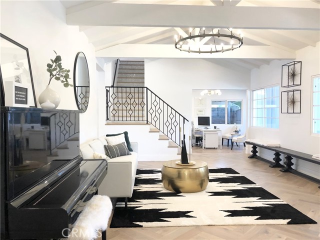 24834 Quigley Canyon Rd. Newhall, California "Diamond in the Rough" HORSE PROPERTY in PLACERITA CANYON one block away from the Master's University and Quigley Canyon Open Spaces and walking distance to Downtown Newhall that looks like it belongs in a designer home magazine! DETACHED GUEST HOUSE--currently being used as an AIRBNB and generating very good income that will offset the mortgage by A LOT. Completely FLAT all usable lot. You can have horses here, or just have a gigantic yard to play on or store all your toys. Feels and looks like new construction since the main house and the guesthouse has been COMPLETELY REMODELED with HIGH END DESIGNER FINISHES THROUGHOUT. Let's start with the main house: Enter the front door and be greeted by the tall ceilings and gorgeous hanging chandelier in the living room. Walk on real hardwood floors with gorgeous herringbone pattern. The chef's kitchen is the heart of the home with marble counter tops, Thermador appliances, including a steam oven, custom cabinets, extra deep sink, warming drawer, drawer microwave and bar seating accented by beautiful pendant lights. Three bedrooms and two full bathrooms on the first floor. Upstairs is the main bedroom and attached ensuite, and two more bedrooms with a Jack and Jill bathroom. The guesthouse: Beautiful studio guesthouse with gorgeous herring bone pattern floors to match the main house. Full kitchen with extra deep sink, and white quartz counter top. A beautiful bathroom with marble floors and walk-in shower. The grounds: Large circular driveway that hugs a majestic oak tree the provides shade in the front. Large driveway behind the gate for additional parking. Heated salt water pool, large fireplace, and outdoor kitchen. HUGE lot for horses in the back. The extras: PAID OFF SOLAR -Never have an electricity bill again! Whole house fan! New insulated garage doors. Two washers and two dryers. A "pool house" by the pool that can be used as an extra bedroom, or living space, or office. Possibilities are endless. There is a barn with two stalls. You can use them as such for your horses or you can use them for storage, or remodel them and make them into even more living space. This home can be a multi-generational home. Again the possibilities are endless. This property is truly unique. Finding a home of this caliber with all that this home has to offer in the canyon is extremely rare. It is truly a "diamond in the rough." You have to see it (your jaw will drop) to believe it. Make this dream home yours!