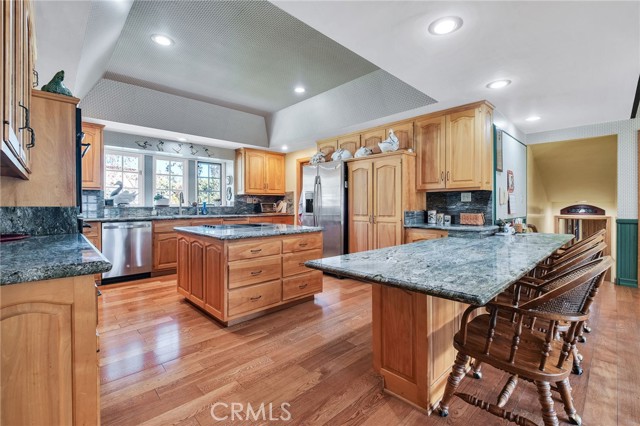 Large island kitchen with breakfast bar and walk-in pantry