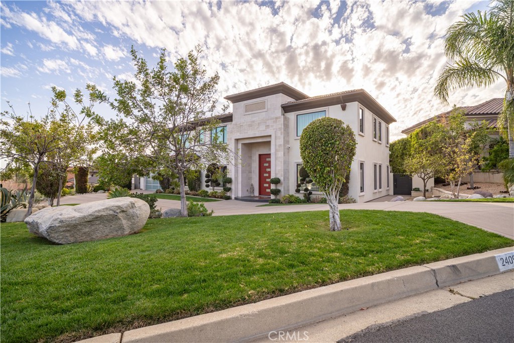 Welcome to a brilliant design that brings together indoor and outdoor spaces with excellent harmony. It was designed for a dynamic and selective buyers; it offers many beautiful designed livable spaces to gather and entertain themselves in spectacular environments. Cliff Road truly encourages entertaining activities and friendly reunions. It all starts at exterior with a Hand Carved Cantera Stone for all Windows & Doors Surrounds, Smooth finish stucco, Fine light fixtures and an elegant entry laminated with natural Cantera stone and an exceptional custom entry door.  It is Truly a statement of character and quality. A proficient and low maintenance design of the front and backyard landscaping displays an assortment of beautiful trees, shrubs and plants; Illuminated with over 20 solid bronze landscaping lights and an efficient irrigation drip system was designed with. Inside the House there are exquisite finishes, architectural details, fine fixtures and complementing materials that elegantly flow from room to room. Formal living and dining room with a 21ft High Ceilings, Impressive Architectural Riviera Stone Partition Wall with a High-Quality Bioethanol Fireplace and LED accent lighting, Wine cellar setting with Exceptional Wine Cellar for over 200 bottles with space for a testing table seating harmonizes the Formal Area, Interior water fall with A stunning17ft high Interior Water-Wall Blends the Formal Area, with the Family Room. It serves as a natural humidifier and It brings a sense of tranquility. Gourmet Kitchen with a 36” Rangetop, Thermador Professional Series, 30” Double Oven, Thermador Masterpiece Series, 30” Built-In Refrigerator, Thermador Column Masterpiece Collection, 24” Built-In Freezer, Thermador Column Masterpiece Collection, 30” Convention Microwave, Thermador, Ultra-Quiet Dish Washer, Thermador Sapphire Masterpiece Collection, 45” Kholer Sink, “Chef Inspire Collection, Stages Line”, Island with an additional 20” Wide Sink.  Master suite, master closet and master bath, 4 additional bedroom suites with 4 lavish baths, an exclusive spa with dedicated Sauna Room, dedicated Shower room (Steam-Room Ready), Vanity Sink Cabinet with Elegant Sink Faucet and Mirror, Toilet by Toto, dedicated Therapy/Massage Room with Ceiling Speakers, Towel Cabinet, and 7ft wide cherry cabinetry with Sink. Stunning 38ft Veranda with 21ft High Ceiling and Massive Columns, Magnificent Pool and SPA, Fire-Pit, Glass Filled, High End BBQ with Burner and much more.