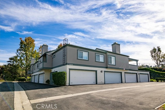 2 car garage that leads into entry level of unit.