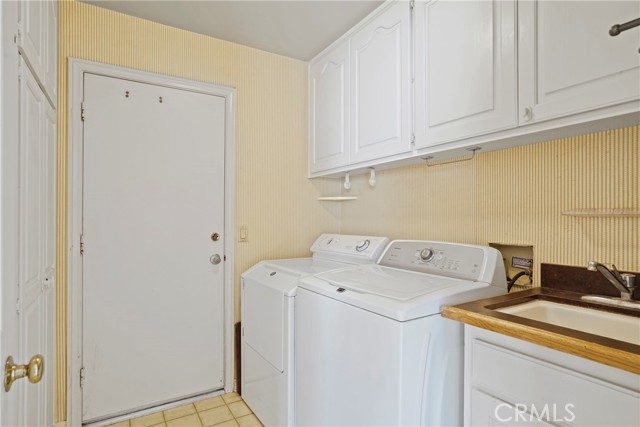 nice sized laundry room with access from garage. tons of storage on the left side!